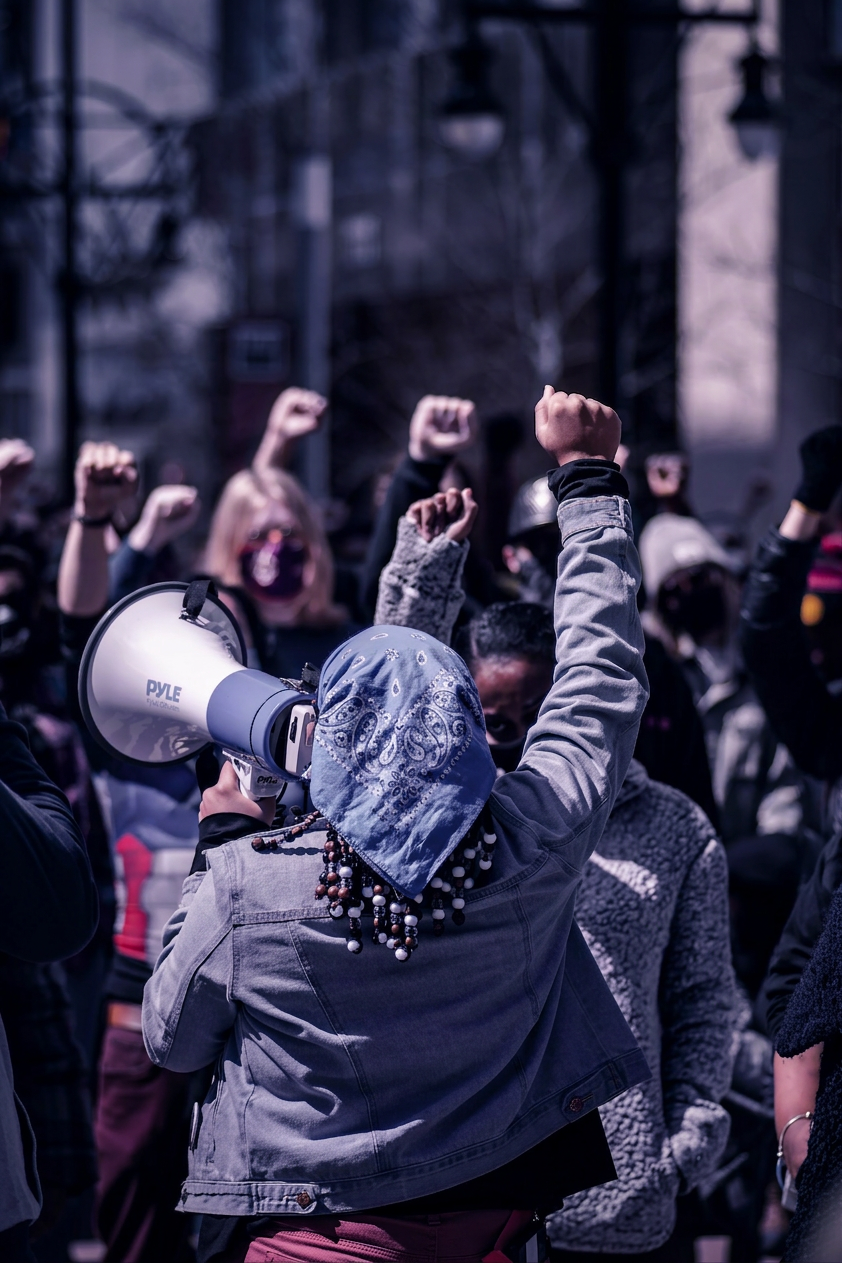 A render of three white cylindrical columns, against a warm creme background